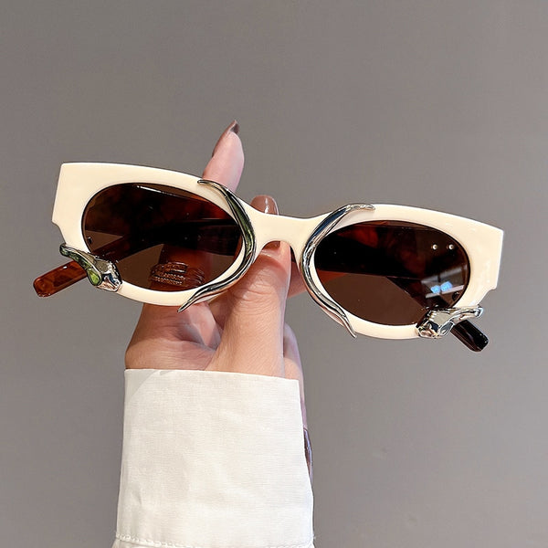 Snake wrapped round cat eye sunglasses