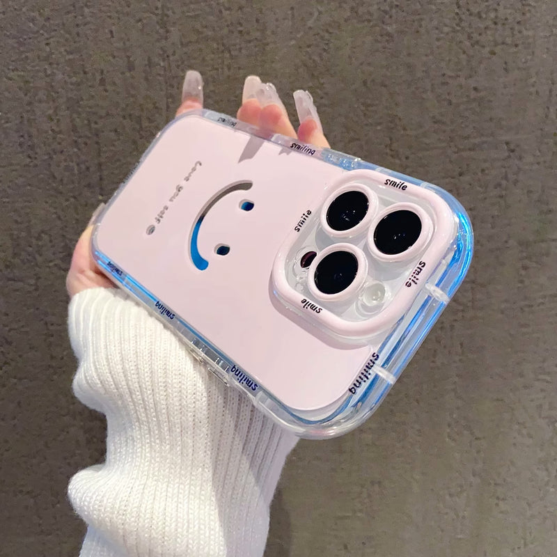 Mirror phone case with painted smiley face, view 3