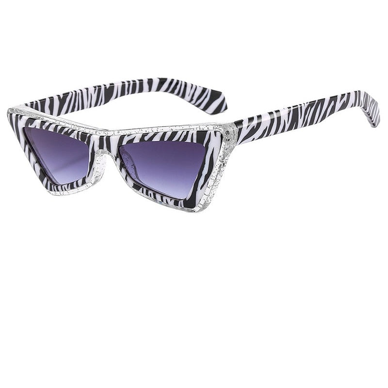 Pyramid shape statement sunglasses, zebra frame with grey lenses